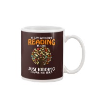 A Day Without Reading Mug tile