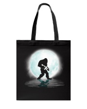 Bigfoot Gun under the moon Tote Bag thumbnail