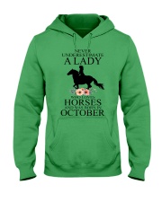 A lady who loves horses and was born in october Hooded Sweatshirt front