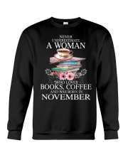 books never underestimate November Crewneck Sweatshirt thumbnail