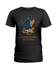 In a world of bookworms be a book dragon Ladies T-Shirt tile