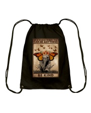 IN A WORLD WHERE YOU CAN BE ANYTHING BE KIND Drawstring Bag tile