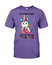 IN A WORLD WHERE YOU CAN BE ANYTHING BE KIND Premium Fit Mens Tee tile