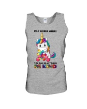IN A WORLD WHERE YOU CAN BE ANYTHING BE KIND Unisex Tank tile