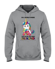 IN A WORLD WHERE YOU CAN BE ANYTHING BE KIND Hooded Sweatshirt tile