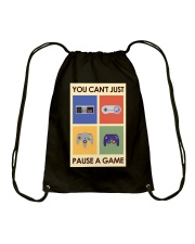 YOU CAN'T JUST PAUSE A GAME Drawstring Bag tile