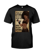 YOU DON'T STOP LIFTING WHEN YOU GET OLD Premium Fit Mens Tee tile