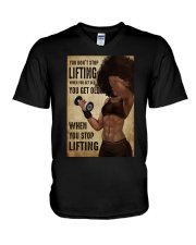 YOU DON'T STOP LIFTING WHEN YOU GET OLD V-Neck T-Shirt tile