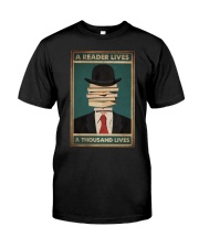 A READER LIVES A THOUSAND LIVES Premium Fit Mens Tee tile
