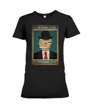 A READER LIVES A THOUSAND LIVES Premium Fit Ladies Tee tile