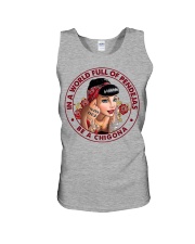 IN A WORLD FULL OF PENDEJAS BE A CHIGONA Unisex Tank tile