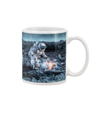Astronaut in suit touching atom molecule Mug thumbnail