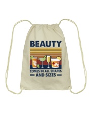 Beauty comes in Drawstring Bag tile