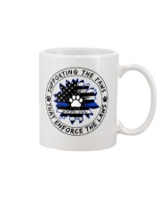 Supporting the paws Mug tile