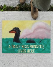 A Dach-ness Monster Lives Here Doormat 22.5" x 15" aos-doormat-22-5x15-lifestyle-front-01