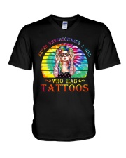 Never underestimate a girl V-Neck T-Shirt tile