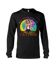 Never underestimate a girl Long Sleeve Tee tile