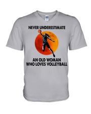 Never underestimate an old woman V-Neck T-Shirt tile