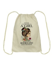 Never underestimate a girl Drawstring Bag tile