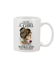 Never underestimate a girl Mug tile