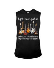 I Got More Guitars Sleeveless Tee tile