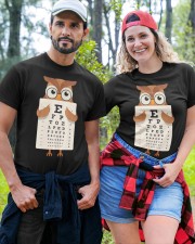 Awesome t-shirt design that features an owl wearing glasses and holding an eye chart. Classic T-Shirt custom-t-shirts-classic-lifestyle-front-380