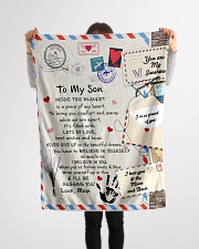 To My Son- Mom Small Fleece Blanket - 30" x 40" aos-coral-fleece-blanket-30x40-lifestyle-front-14