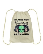 In A World Full Of Humans Drawstring Bag tile