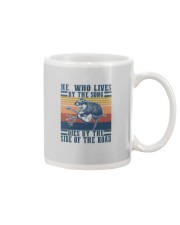 HE WHO LIVES BY THE SONG Mug tile