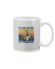 IN A DEA OF FISH BE A PURRMAID Mug tile