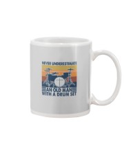 AN OLD MAN WITH A DRUM SET Mug thumbnail