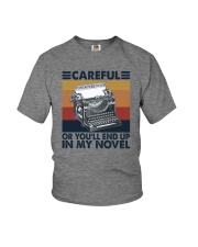 CAREFUL OR YOU'LL END UP IN MY NOVEL Youth T-Shirt tile
