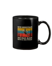 NEVER UNDERESTIMATE AN OLDMAN WITH SKI POLES Mug thumbnail