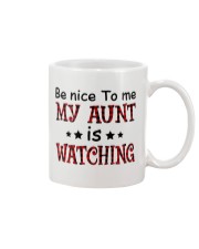 BE NICE TO ME MY AUNT IS WATCHING Mug thumbnail