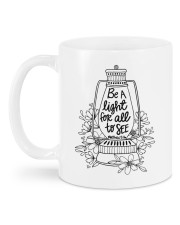 Be a light for all to see Mug back