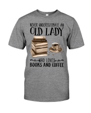 An Old Lady Who Loves Books And Coffee Premium Fit Mens Tee tile