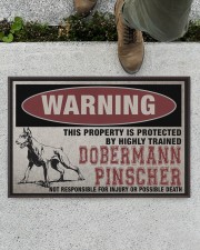 Dobermann this property is protected Doormat 22.5" x 15" aos-doormat-22-5x15-lifestyle-front-01