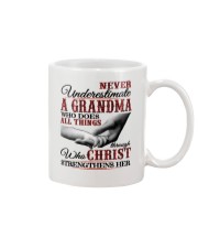 Never Underestimate A Grandma N Mug tile