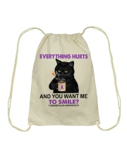 Everything hurts Drawstring Bag tile