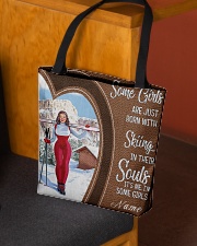 Skiing girl born custom tote lqt-ngt All-over Tote aos-all-over-tote-lifestyle-front-02
