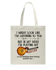 I Might Look Like I'm Listening Tote Bag tile