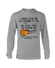 I Might Look Like I'm Listening Long Sleeve Tee tile