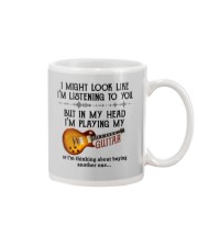 I Might Look Like I'm Listening Mug tile