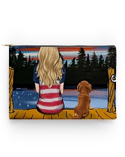 Girl and Dachshund sitting at dock Accessory Pouch tile