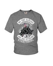 We owe illegal nothing Youth T-Shirt tile