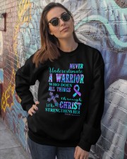 Never underestimate a warrior Crewneck Sweatshirt lifestyle-unisex-sweatshirt-front-3