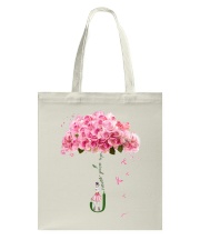 Never give up Tote Bag tile
