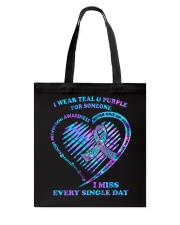 I wear teal and purple Tote Bag tile