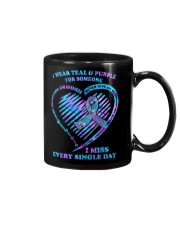 I wear teal and purple Mug tile