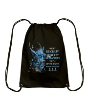 Might be crazy Drawstring Bag tile